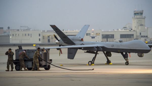 Senior Airman Jorge Garcia, 9th Aircraft Maintenance Unit assistant dedicated crew chief; Staff Sgt. Joseph Figueroa, 29th AMU avionics expeditor and 1st Lt. Ken Steamer, 29th AMU assistant officer in charge, help launch an MQ-9 Reaper during Exercise Agile Reaper, Sept. 15, 2020, at Naval Air Station Point Mugu, California. This routine training exercise enhances participants’ MQ-9 skill sets and allows them to build the maritime domain picture with joint partners. - Sputnik International