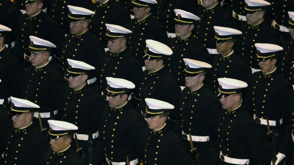 U.S. Naval Academy, Md. (Nov. 21, 2003) -- U.S. Naval Academy Midshipmen stand at parade-rest during a ceremony in Alumni Hall honoring distinguished graduates. U.S. Navy photo by Photographer's Mate 2nd Class Damon J. Moritz - Sputnik International