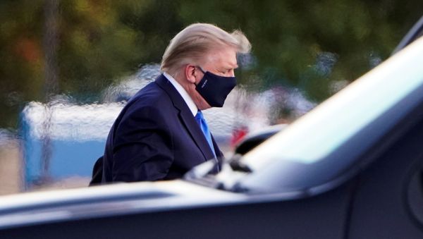 US President Donald Trump arrives at Walter Reed National Military Medical Center by helicopter after the White House announced that he will be working from the presidential offices at Walter Reed for the next few days after testing positive for the coronavirus disease (COVID-19), in Bethesda, Maryland, US, October 2, 2020 - Sputnik International