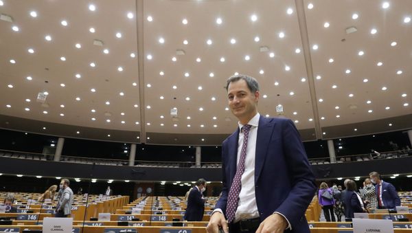 Belgium's new Prime Minister Alexander De Croo is seen at the end of a plenary session of the Belgian Parliament, taking place at the European Parliament to respect the coronavirus disease (COVID-19) safety rules, in Brussels, Belgium October 2, 2020. - Sputnik International