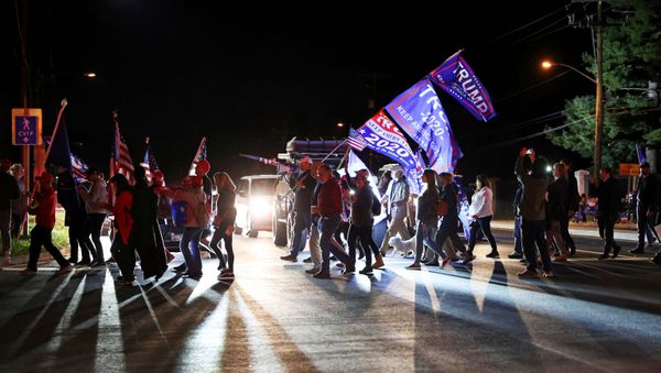 Supporters rally at a vigil for U.S. President Donald Trump outside of Walter Reed National Military Medical Center, where he is being treated for coronavirus disease (COVID-19) in Bethesda, Maryland, U.S. October 3, 2020. - Sputnik International