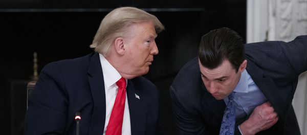 President Donald Trump speaks to White House special assistant to the president Nick Luna, during a roundtable with governors on the reopening of America's small businesses, in the State Dining Room of the White House - Sputnik International