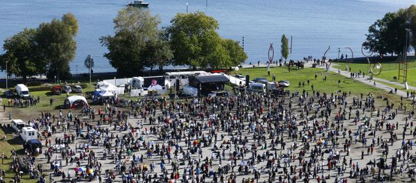 A general view taken from a wheel shows people gathering during a protest against the government's restrictions, amid the coronavirus disease (COVID-19) outbreak, in Konstanz, Germany October 4, 2020 A general view taken from a wheel shows people gathering during a protest against the government's restrictions, amid the coronavirus disease (COVID-19) outbreak, in Konstanz, Germany October 4, 2020 - Sputnik International