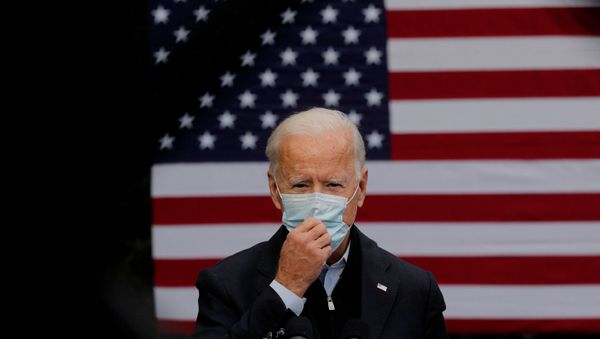 Democratic U.S. presidential nominee Joe Biden speaks about the economy and the coronavirus disease (COVID-19) pandemic during a campaign stop at UFCW (United Food and Commercial Workers) Local 951 in Grand Rapids, Michigan, U.S., October 2, 2020. Democratic U.S. presidential nominee Joe Biden speaks about the economy and the coronavirus disease (COVID-19) pandemic during a campaign stop at UFCW (United Food and Commercial Workers) Local 951 in Grand Rapids, Michigan, U.S., October 2, 2020. - Sputnik International