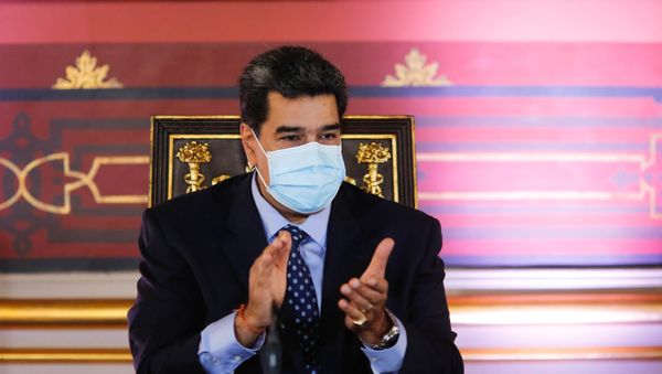This handout picture released by Venezuelan Presidency shows Venezuela's President Nicolas Maduro attending a meeting with members of the National Constituent Assembly (ANC) at the Federal Legislative Palace in Caracas on September 29, 2020, amid the COVID-19 novel coronavirus pandemic. - Sputnik International