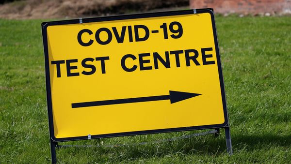 A sign is seen outside a walk-in test facility following the outbreak of the coronavirus disease (COVID-19) in the Farnworth area of Bolton, Britain, September 15, 2020 - Sputnik International