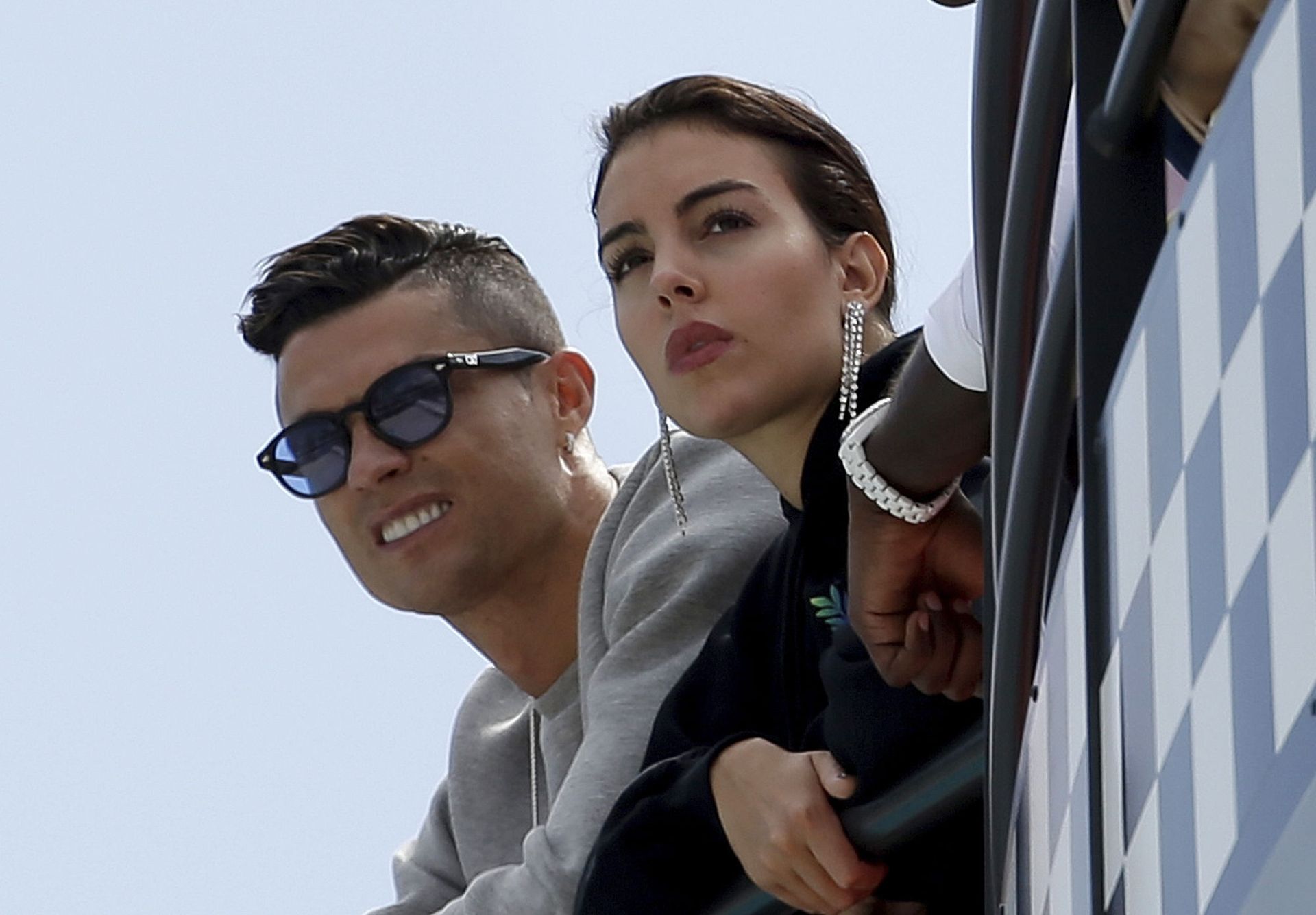 In this May 23, 2019, file photo, Cristiano Ronaldo, left, is flanked by his partner Georgina Rodriguez as they watch the second practice session for a Formula One race at the Monaco racetrack, in Monaco In this May 23, 2019, file photo, Cristiano Ronaldo, left, is flanked by his partner Georgina Rodriguez as they watch the second practice session for a Formula One race at the Monaco racetrack, in Monaco - Sputnik International, 1920, 07.09.2021