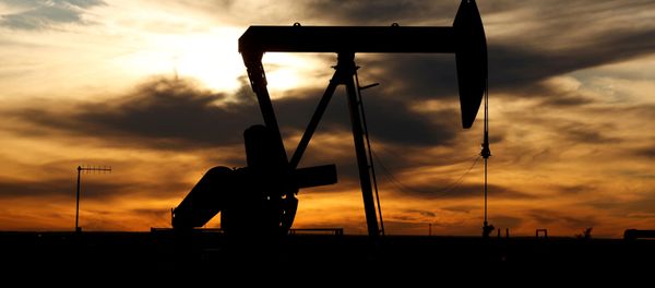 FILE PHOTO: the sun sets behind a crude oil pump jack on a drill pad in the Permian Basin in Loving County, Texas, U.S. November 24, 2019. Picture taken November 24, 2019 FILE PHOTO: the sun sets behind a crude oil pump jack on a drill pad in the Permian Basin in Loving County, Texas, U.S. November 24, 2019. Picture taken November 24, 2019 - Sputnik International