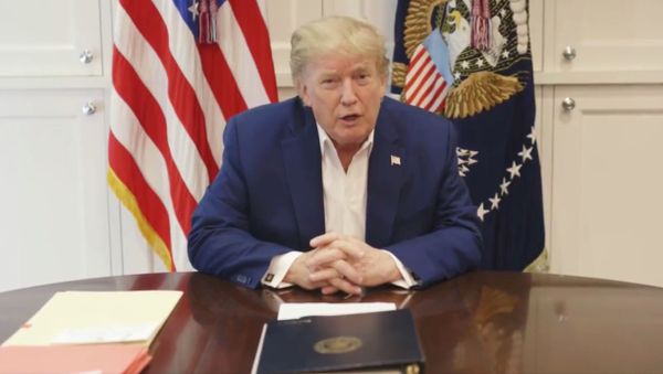 U.S. President Donald Trump, who is being treated for the coronavirus disease (COVID-19) in a military hospital outside Washington, speaks from his hospital room - Sputnik International