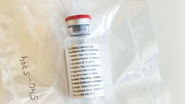 One vial of the drug Remdesivir lies during a press conference about the start of a study with the Ebola drug Remdesivir in particularly severely ill patients at the University Hospital Eppendorf (UKE) in Hamburg, northern Germany on April 8, 2020, amidst the new coronavirus COVID-19 pandemic - Sputnik International