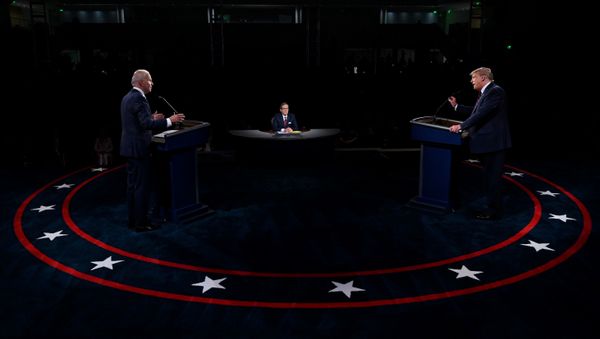 US President Donald Trump and Democratic presidential candidate, former Vice President Joe Biden participate in the first presidential debate at Case Western University and Cleveland Clinic, in Cleveland, Ohio, US, September 29, 2020 - Sputnik International