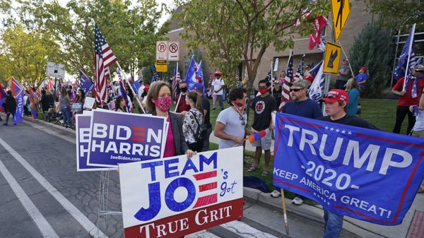People holding signs in support gather near the site of the vice presidential debate between Vice President Mike Pence and Sen. Kamala Harris, at the University of Utah on Wednesday, Oct. 7, 2020, in Salt Lake City - Sputnik International