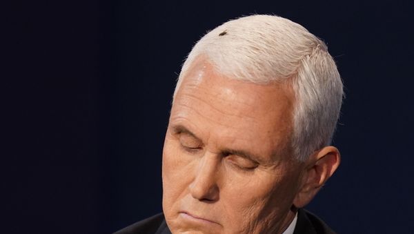Vice President Mike Pence listens to Democratic vice presidential candidate Sen. Kamala Harris, D-Calif., during the vice presidential debate Wednesday, Oct. 7, 2020, at Kingsbury Hall on the campus of the University of Utah in Salt Lake City.  - Sputnik International