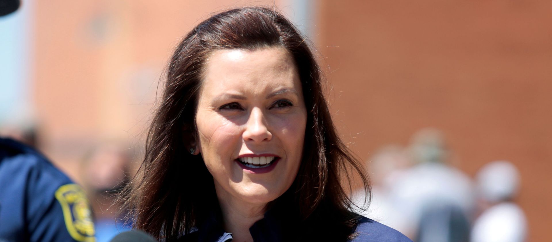 Michigan Governor Gretchen Whitmer addresses the media about the flooding along the Tittabawassee River, after several dams breached, in downtown Midland, Michigan, U.S., May 20, 2020. REUTERS/Rebecca Cook - Sputnik International, 1920, 08.10.2020