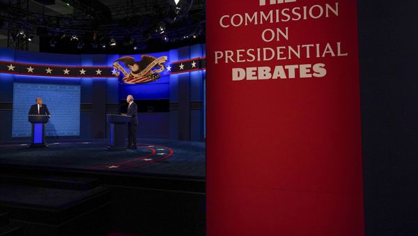 President Donald Trump and Democratic presidential candidate former Vice President Joe Biden during the first presidential debate Tuesday, Sept. 29, 2020, at Case Western University and Cleveland Clinic, in Cleveland, Ohio. (AP Photo/Julio Cortez) - Sputnik International