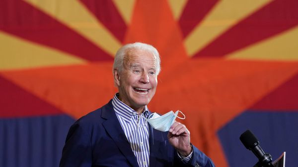 U.S. Democratic presidential candidate Joe Biden holds a face mask while speaking at a carpenters union in Phoenix, Arizona, U.S., October 8, 2020 U.S. Democratic presidential candidate Joe Biden holds a face mask while speaking at a carpenters union in Phoenix, Arizona, U.S., October 8, 2020 - Sputnik International
