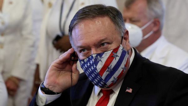 U.S. Secretary of State Mike Pompeo adjusts his earphones during a Te Deum as part of the swearing-in ceremony of Dominican Republic's new President Luis Abinader in Santo Domingo, Dominican Republic August 16, 2020.  - Sputnik International
