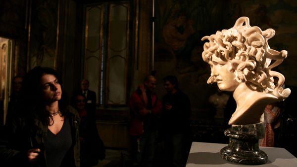 A visitor looks at a marble bust, Bust of Medusa, made by Italian sculptor Gian Lorenzo Bernini between 1644 and 1648, during its inauguration at Rome's Capitolini Museum after its restoration, Wednesday, Nov. 22, 2006. The bust, Bernini's depiction of the Greek mythological character Medusa, is considered one of the most original interpretations of the female myth whose gaze could turn people to stone. - Sputnik International