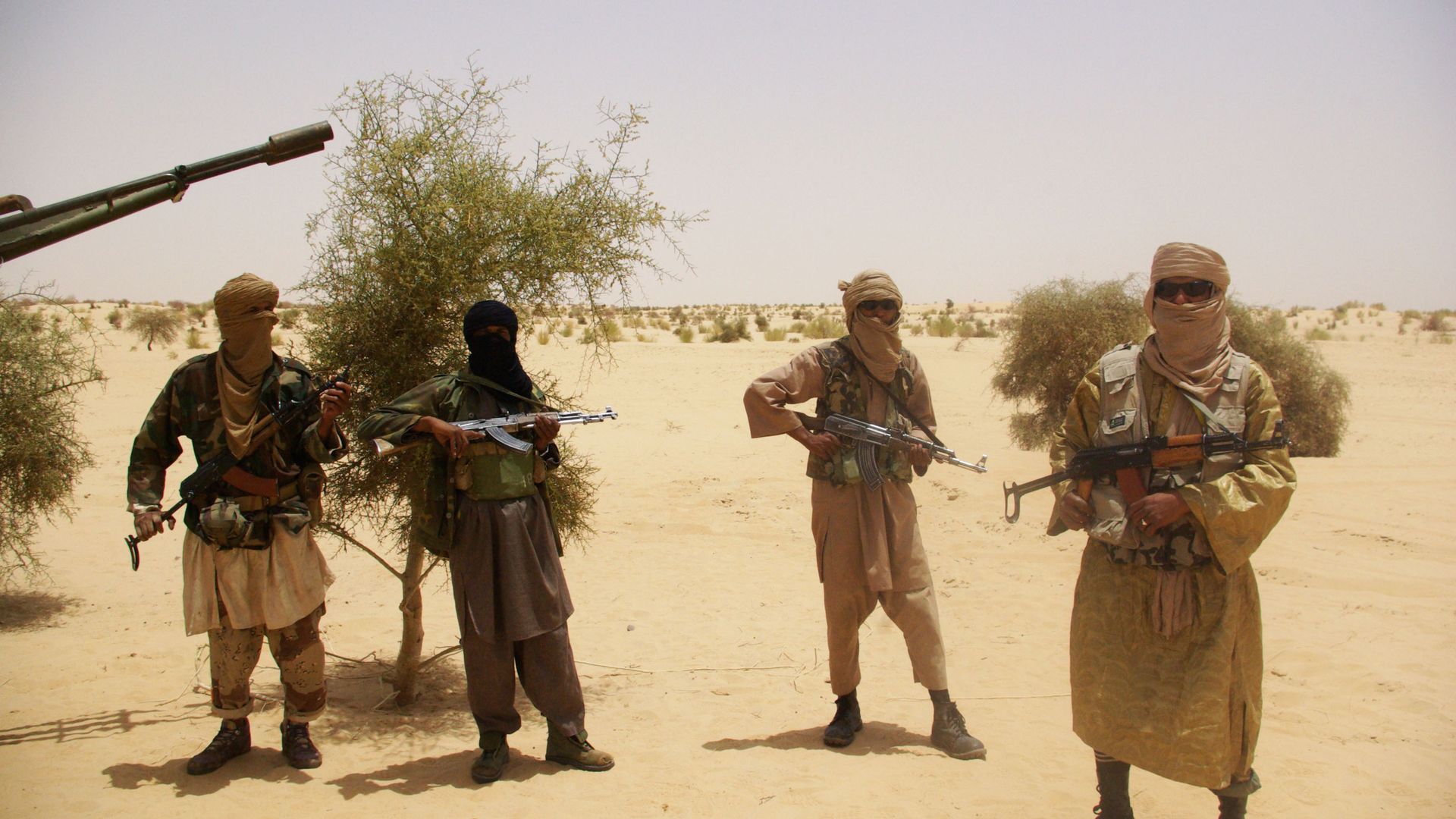 In this Tuesday, April 24, 2012 file photo, fighters from Islamist group Ansar Dine stand guard during a hostage handover, in the desert outside Timbuktu, Mali. In this Tuesday, April 24, 2012 file photo, fighters from Islamist group Ansar Dine stand guard during a hostage handover, in the desert outside Timbuktu, Mali. - Sputnik International, 1920, 05.05.2021