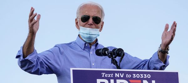 Democrat US presidential nominee Joe Biden speaks during a drive-in campaign event at the Southeast Career Technical Academy in Las Vegas, Nevada, 9 October 2020. Democrat US presidential nominee Joe Biden speaks during a drive-in campaign event at the Southeast Career Technical Academy in Las Vegas, Nevada, 9 October 2020. - Sputnik International