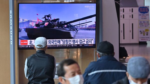 People watch TV news broadcasting file footage of a military parade of North Korean soldiers and weapons, at a railway station in Seoul on 10 October 2020. Nuclear-armed North Korea was expected to parade its latest and most advanced weapons through the streets of Pyongyang on 10 October, as the coronavirus-barricaded country celebrated the 75th anniversary of leader Kim Jong-un's ruling party. People watch TV news broadcasting file footage of a military parade of North Korean soldiers and weapons, at a railway station in Seoul on 10 October 2020. Nuclear-armed North Korea was expected to parade its latest and most advanced weapons through the streets of Pyongyang on 10 October, as the coronavirus-barricaded country celebrated the 75th anniversary of leader Kim Jong-un's ruling party. - Sputnik International