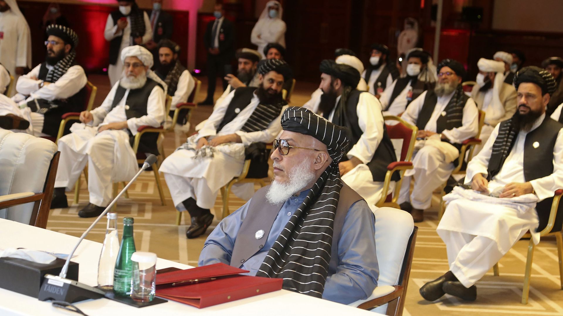 In this Sept. 12, 2020, file photo, Taliban negotiator Abbas Stanikzai, center front, and his delegation attend the opening session of peace talks between the Afghan government and the Taliban, in Doha, Qatar. Afghanistan’s Taliban on Thursday, Oct. 8, 2020, welcomed a tweet from President Donald Trump in which he promised to have the last of the U.S.'s troops out of Afghanistan by Christmas. If that withdrawal happens, it would be months ahead of schedule and the tweet made no reference to a Taliban promise to fight terrorist groups — a previous pre-requisite for an American withdrawal. - Sputnik International, 1920, 20.08.2021
