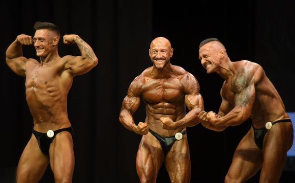 Bodybuilders react during a championship in Kazan Bodybuilders react during a championship in Kazan - Sputnik International