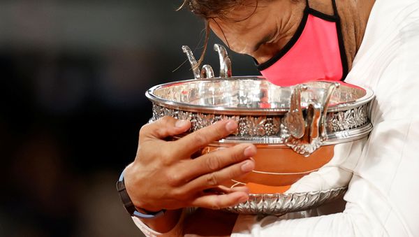 Tennis - French Open - Roland Garros, Paris, France - October 11, 2020 Spain’s Rafael Nadal celebrates with the trophy after winning the French Open final against Serbia’s Novak Djokovic REUTERS/Christian Hartmann     TPX IMAGES OF THE DAY - Sputnik International