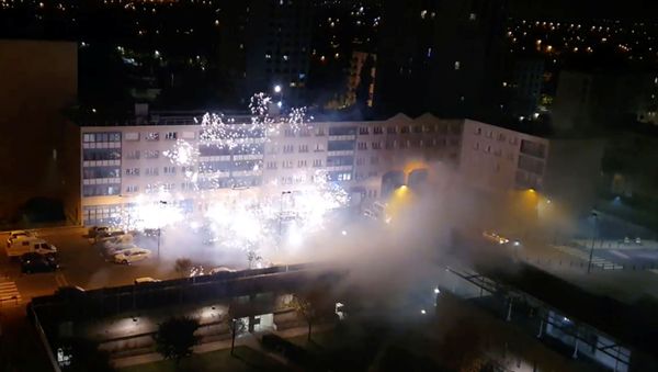 People use fireworks as projectiles as they stage an attack on a police station in Champigny, metropolitan Paris, France October 11, 2020 in this still image taken from social media video. - Sputnik International