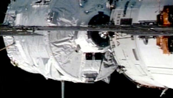 In this image from NASA Television, the Jules Verne Automated Transfer Vehicle approaches the on the International Space Station's Zvezda Service Module for docking, Thursday, April 3, 2008. - Sputnik International