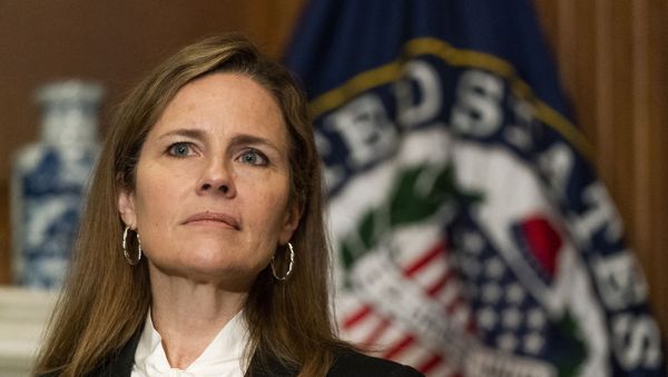 n this Oct. 1, 2020, file photo President Donald Trump's Supreme Court nominee Judge Amy Coney Barrett listens as Sen. Jerry Moran, R-Kan., not shown, speaks during their meeting on Capitol Hill in Washington - Sputnik International