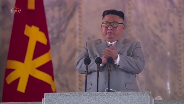 A screen grab taken from a KCNA broadcast on 10 October 2020 shows North Korean leader Kim Jong Un addressing attendees of a military parade on Kim Il Sung square in Pyongyang. A screen grab taken from a KCNA broadcast on 10 October 2020 shows North Korean leader Kim Jong Un addressing attendees of a military parade on Kim Il Sung square in Pyongyang. - Sputnik International
