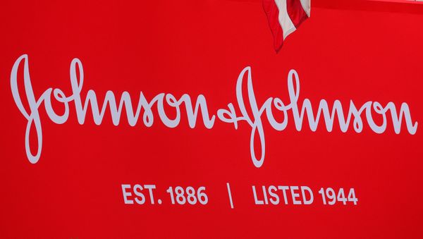 The company logo for Johnson & Johnson is displayed to celebrate the 75th anniversary of the company's listing at the New York Stock Exchange (NYSE) in New York, U.S., September 17, 2019. - Sputnik International