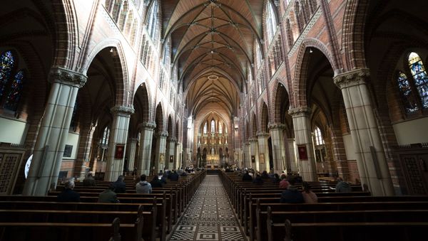 Visitors attend mass in the Vitus Church in Hilversum on 11 October 2020, amid the coronavirus pandemic. The bishops of the Roman Catholic Church in the Netherlands are asking parishes and religious communities to scale down gatherings as soon as possible to a maximum of 30 attendees in the upcoming liturgical celebrations - Sputnik International