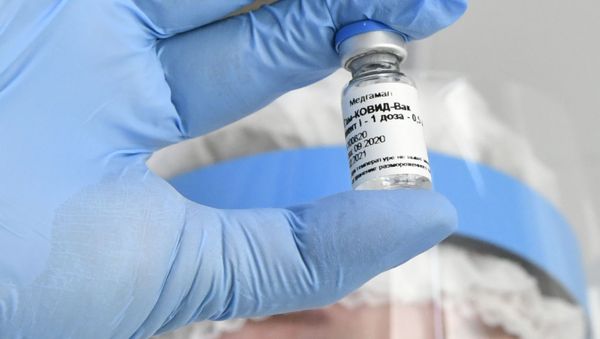 Health staff holds the Russian coronavirus vaccine Gam-COVID-Vac, trade-named Sputnik V, developed by the Gamaleya Scientific Research Institute of Epidemiology and Microbiology during the vaccination of medical workers, in Krasnodar, Russia - Sputnik International