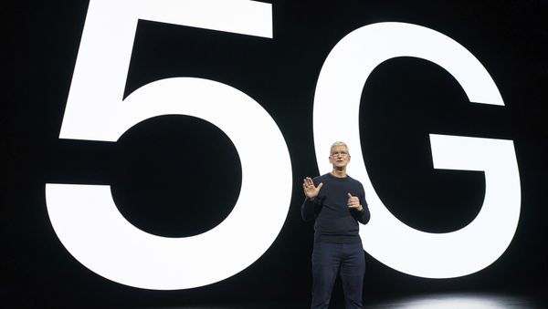 In this photo released by Apple, Tim Cook, chief executive of the software giant, speaks about 5G during an Apple event at Apple Park in Cupertino, California on 13 October 2020. - Sputnik International