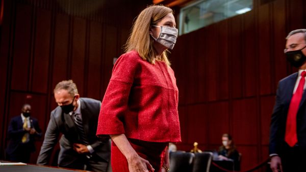 US Supreme Court nominee Judge Amy Coney Barrett departs at the end of the more than eleven hour-long second day of her nomination hearing before the US Senate Judiciary Committee on Capitol Hill in Washington, October 13, 2020 US Supreme Court nominee Judge Amy Coney Barrett departs at the end of the more than eleven hour-long second day of her nomination hearing before the US Senate Judiciary Committee on Capitol Hill in Washington, October 13, 2020 - Sputnik International