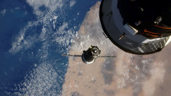 The Soyuz MS-17 spacecraft carrying the crew formed of Kathleen Rubins of NASA, Sergey Ryzhikov and Sergey Kud-Sverchkov of the Russian space agency Roscosmos is seen before docking to Rassvet module of the International Space Station (ISS), October 14, 2020, in this picture taken by Russian cosmonaut Ivan Vagner from the International Space Station (ISS). - Sputnik International