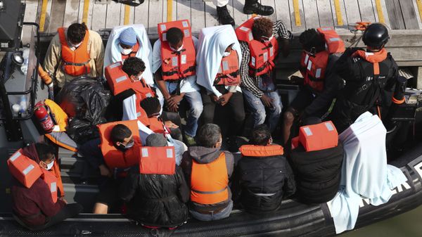 A group of people, thought to be migrants wait on a Border Force rib to come ashore at Dover marina in Kent, England after a small boat incident in the English Channel, Tuesday Sept. 22, 2020.  - Sputnik International