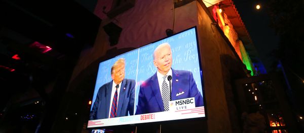 WEST HOLLYWOOD, CALIFORNIA - SEPTEMBER 29: A broadcast of the first debate between President Donald Trump and Democratic presidential nominee Joe Biden is played on a TV at The Abbey, which seated patrons at socially distanced outdoor tables, on September 29, 2020 in West Hollywood, California. - Sputnik International