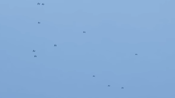 A swarm of loitering munitions, also called suicide drones, launched by the China Academy of Electronics and Information Technology in a September 2020 test - Sputnik International