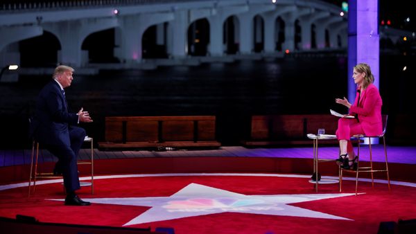 U.S. President Donald Trump speaks with host Savannah Guthrie during a live one-hour NBC News town hall forum with a group of Florida voters in Miami, Florida, U.S., October 15, 2020. - Sputnik International