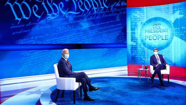 U.S. Democratic presidential candidate Joe Biden sits on stage beside host George Stephanopoulos, ahead of an ABC Town Hall event at the National Constitution Center in Philadelphia, Pennsylvania, U.S., October 15, 2020 - Sputnik International