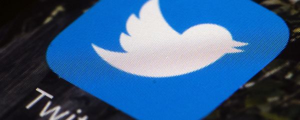 This April 26, 2017, file photo shows the Twitter app icon on a mobile phone in Philadelphia. A tech-focused civil liberties group on Tuesday, June 2, 2020, sued to block President Donald Trump's executive order that seeks to regulate social media, saying it violates the First Amendment and chills speech - Sputnik International