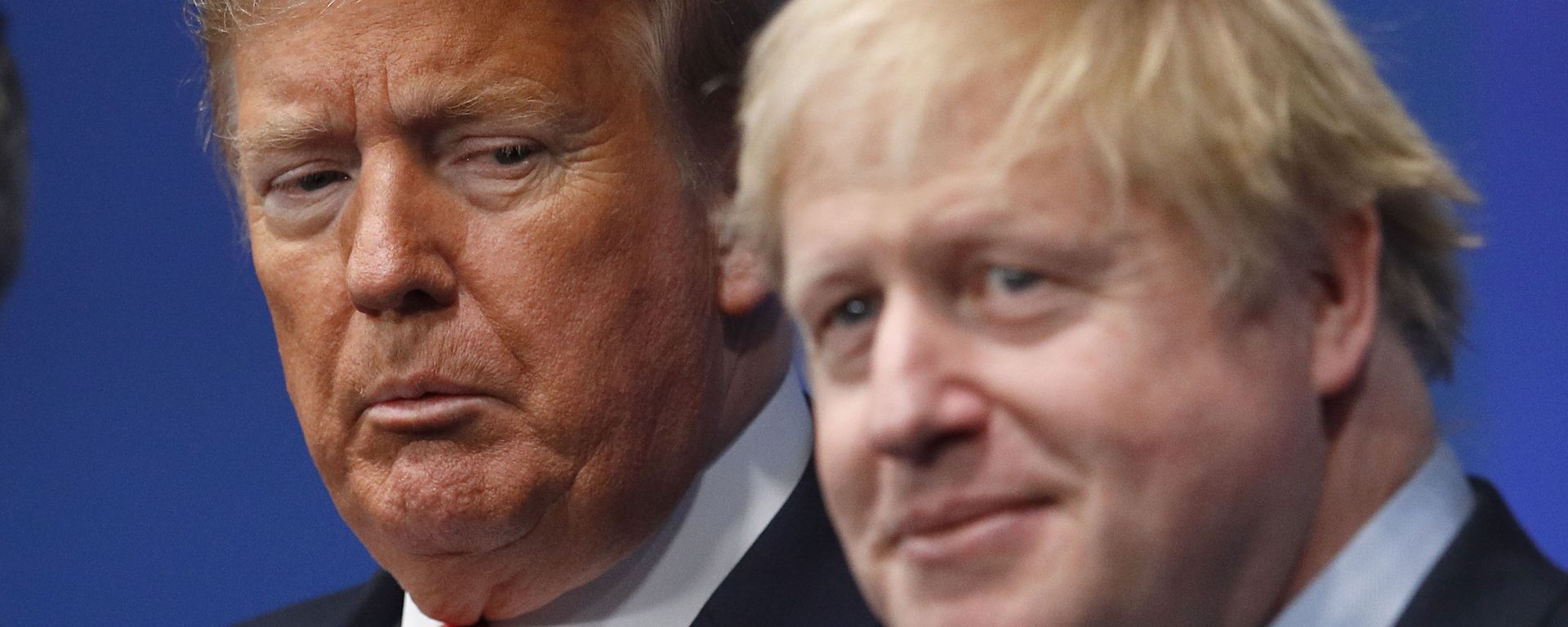 British Prime Minister Boris Johnson, right, and U.S. President Donald Trump pose during a group photo during a NATO leaders meeting at The Grove hotel and resort in Watford, Hertfordshire, England, Wednesday, Dec. 4, 2019 British Prime Minister Boris Johnson, right, and U.S. President Donald Trump pose during a group photo during a NATO leaders meeting at The Grove hotel and resort in Watford, Hertfordshire, England, Wednesday, Dec. 4, 2019 - Sputnik International, 1920, 17.12.2020