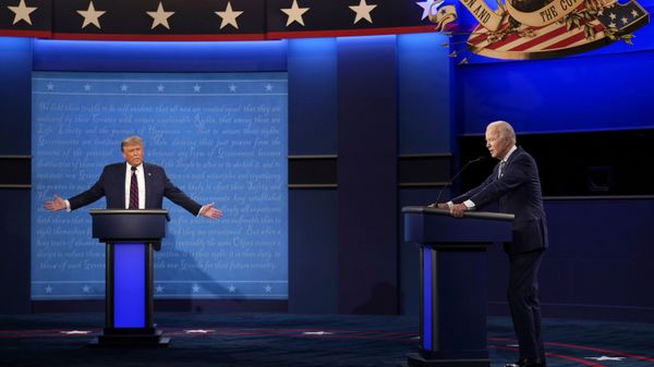President Donald Trump, left, reacts as former Vice President Joe Biden speaks during the first presidential debate Tuesday, Sept. 29, 2020, at Case Western University and Cleveland Clinic, in Cleveland, Ohio - Sputnik International