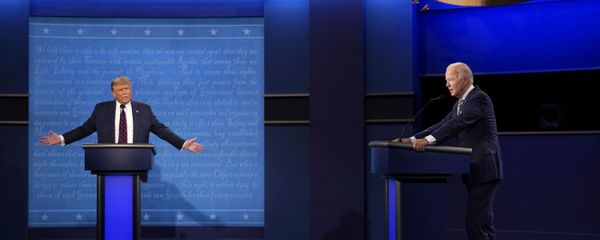 President Donald Trump, left, reacts as former Vice President Joe Biden speaks during the first presidential debate Tuesday, Sept. 29, 2020, at Case Western University and Cleveland Clinic, in Cleveland, Ohio - Sputnik International