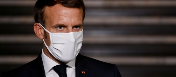 French President Emmanuel Macron wearing a face mask delivers a speech at the end of a visit about the fight against separatism at the Seine-Saint-Denis prefecture headquarters in Bobigny, near Paris, France October 20, 2020.  - Sputnik International