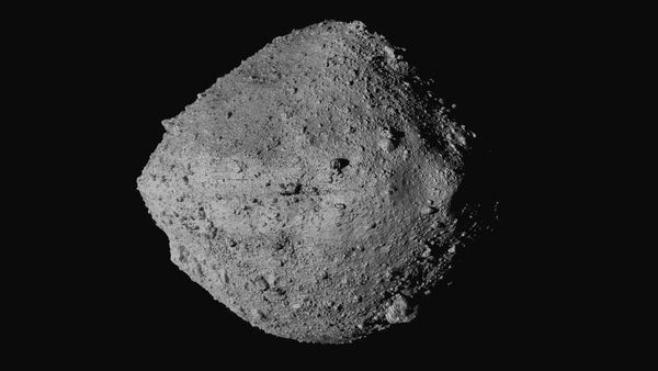 This undated image made available by NASA shows the asteroid Bennu from the OSIRIS-REx spacecraft. After almost two years circling the ancient asteroid, OSIRIS-REx will attempt to descend to the treacherous, boulder-packed surface and snatch a handful of rubble on Tuesday, Oct. 20, 2020. - Sputnik International