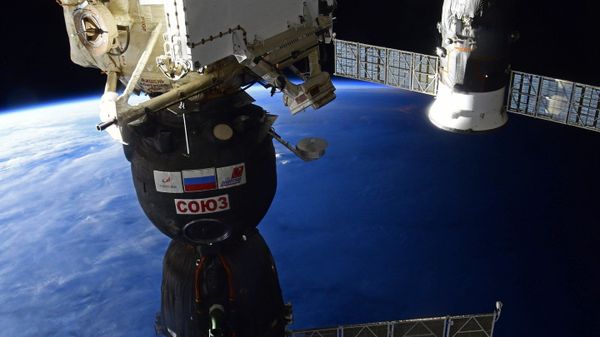 A Roscosmos Soyuz MS-16 spacecraft preparing to undock from the International Space Station (ISS) before returning to Earth. - Sputnik International